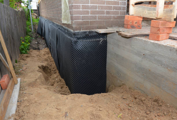 Happy homeowners after waterproofing job in Appleton
